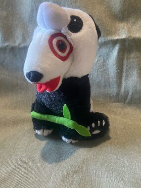 Target Bullseye Dog wearing Panda costume with green bamboo